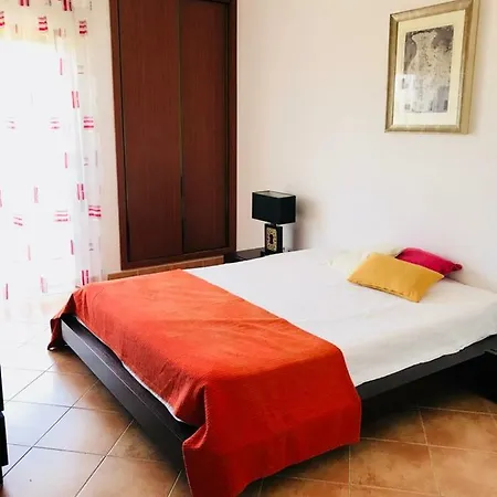 Апартаменты Apartamento Castelos Da Rocha Портиман
